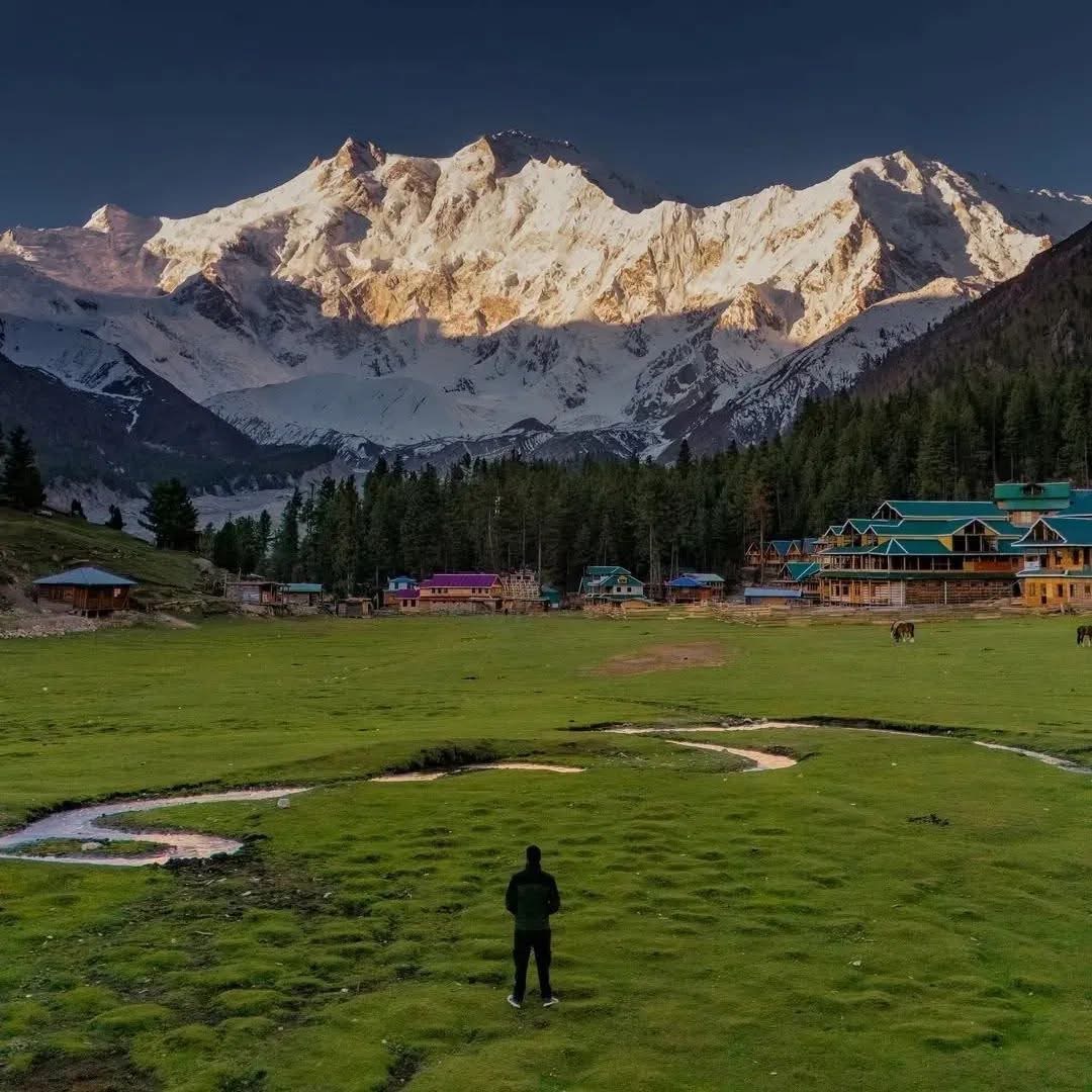 Sunrise alpenglow on Nanga Parbat from the Broad View porch.